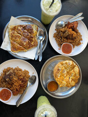 Aromatic dishes enjoyed with chilled green drinks.