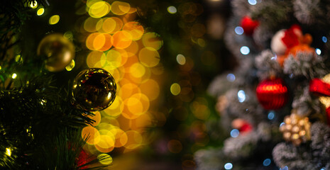Blurred holiday background with bokeh. Defocused New Year and Christmas illumination
