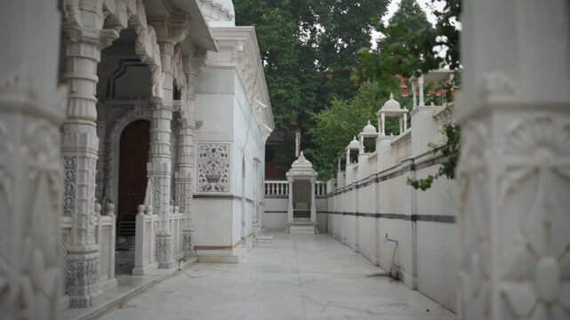 Aerial and ground shots of Lacchuar Jain Temple in Jamui, Bihar showcasing its ancient Jain architecture, serene hilltop setting and peaceful natural surroundings. Clear details, clean lines and herit