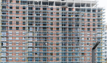 Construction of a building using scaffolding