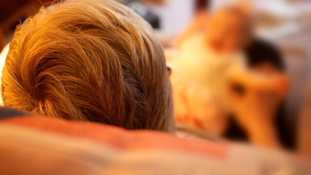 Grandmother Playing with Newborn Baby Granddaughter - Powered by Adobe