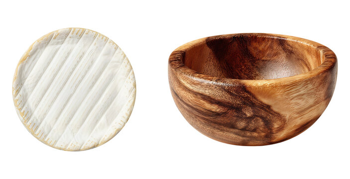Camembert cheese wheel with rind texture beside a small dark wood serving bowl for snacks appetizers or gourmet food presentation on white background dairy and