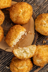 sweet cookies with coconut pieces , a group of sweet and delicious freshly made cookies for a tea party close up