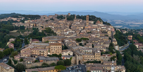 Fototapeta premium Historic hilltop town of Volterra at dusk - Volterra, Italy