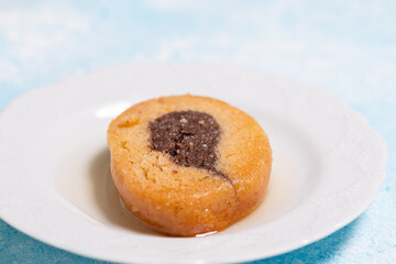 Close-Up of Karagoz Dessert on White Plate