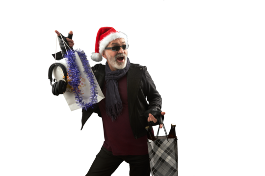 Rocker Santa's Christmas shopping. A contented adult man wearing a Santa Claus hat and carrying shopping bags. PNG.