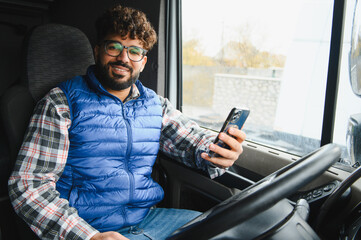 Truck driver using smartphone app for logistics