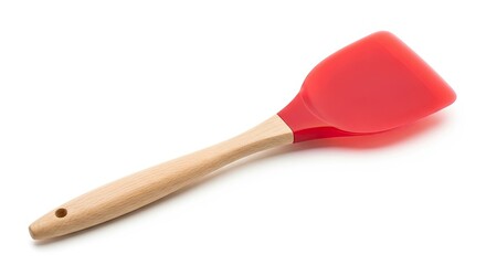 Modern kitchenware red silicone spatula with wooden handle ready for cooking delicious meals and baking tasty treats in your vibrant home kitchen