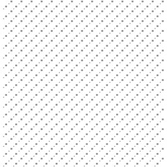 A dense pattern of small dark dots arranged diagonally across a white background