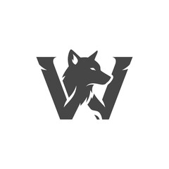 Obraz premium Bold, dark gray letter W logo with a chiseled texture, featuring an integrated wolf head profile.