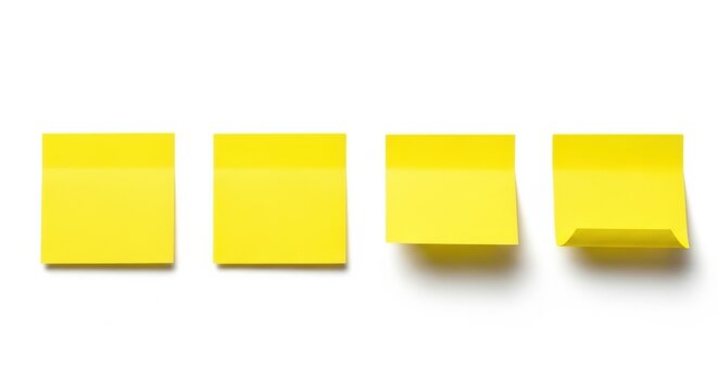 Four yellow sticky notes blank office supplies memo pad.