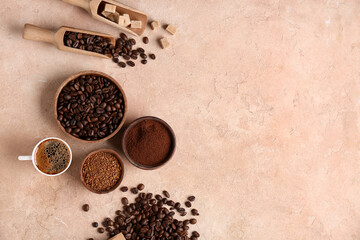 Cup of coffee with beans, powder and sugar cubes on beige grunge background