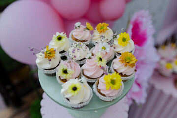 colorful cupcakes on a cake stand