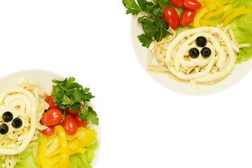 Vegetarian raw food in white plates.