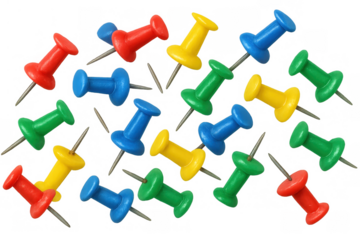 Colorful pushpins scattered on a transparent background, symbolizing organization, attachment, and office work