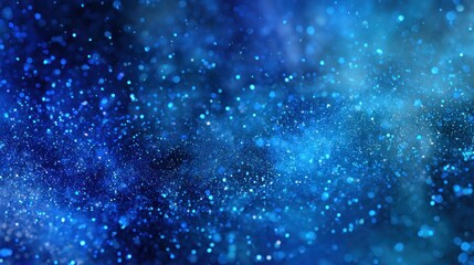 Abstract background of blue and white particles with glowing effect