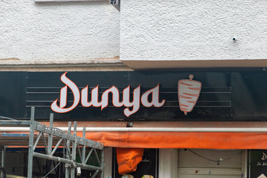 Berlin, Germany - November 2, 2025: Sign and logo of Dunya kebab in Berlin.
