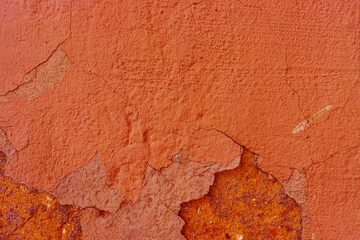 Background of cracked, damaged grey plaster.