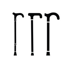 Set of three walking canes silhouette icons illustrating mobility aid sticks for elderly support, disability assistance and medical care