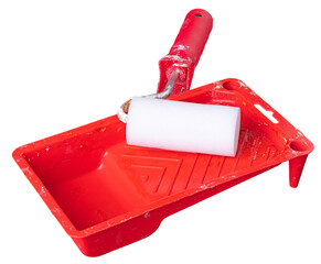 Paint tray with paint roller on an isolated background.