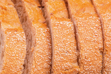 Sliced buckwheat bread as a background macro photo.