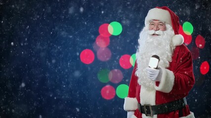 Jolly Santa Claus holding a modern smartphone, connecting digitally to spread holiday cheer and season's greetings amidst a festive backdrop of twinkling lights and falling snow