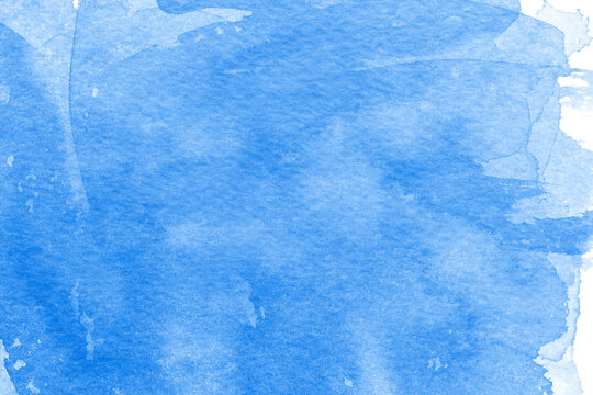 Abstract blue watercolor background. The color splashing on the paper.