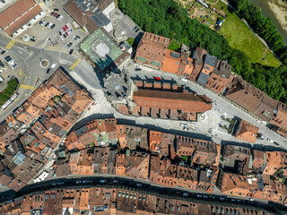 Aerial view of St Nicolas Cathedral in old town of Fribourg. Medieval church with large tower in Europe.