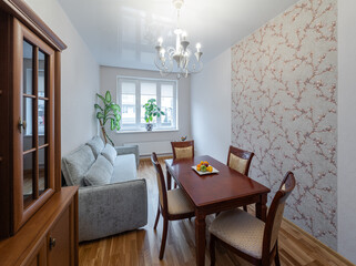Interior photo of Living room with furniture, table and decorative elements.