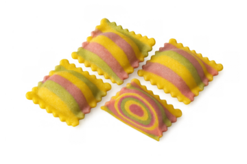 Uncooked colorful striped ravioli pasta with vibrant patterns, traditional italian cuisine, fresh food preparation on transparent background