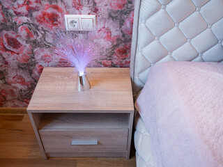 The bedroom in the apartment is in colorful bright red tones.