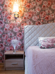 The bedroom in the apartment is in colorful bright red tones.