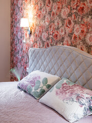 The bedroom in the apartment is in colorful bright red tones.