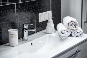 Bathroom in the apartment. Shower stall and bathtub.