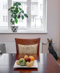 Interior photo of Living room with furniture, table and decorative elements.