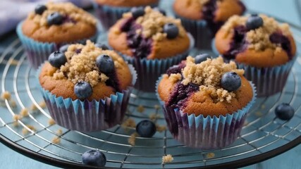 Blueberry muffins with crumble topping for breakfast, mp4 video. AI
