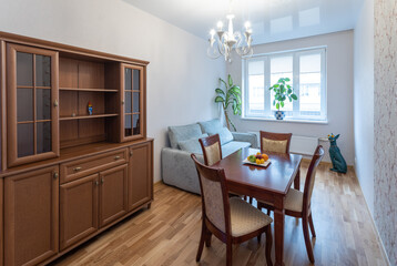 Interior photo of Living room with furniture, table and decorative elements.