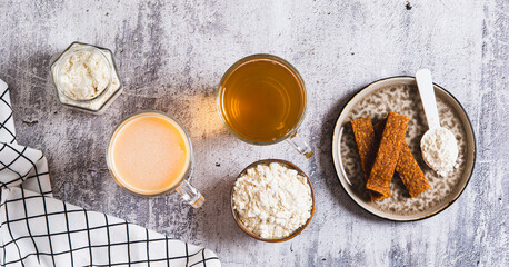 Protein nutrition and green tea for skin microbiome care set top view web banner