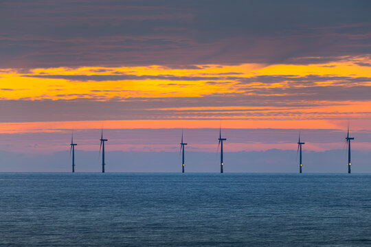 windmill alternative renewable and clean electricity power energy from turbine generation wind farm in the ocean environmental green field technology for future global warming energy solution