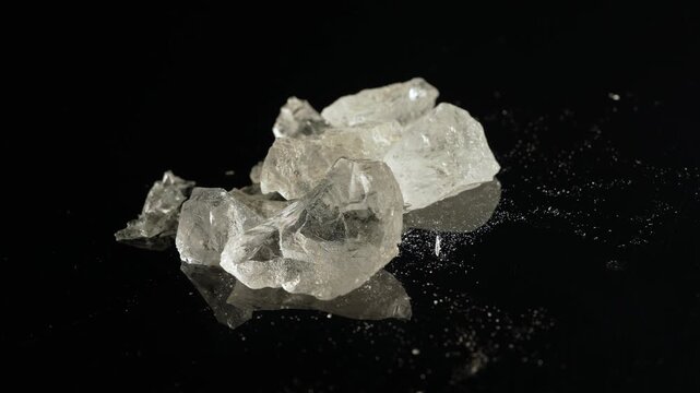 MDMA crystals rocks, crushed and swallowed, snorted or dabbed with oral ingestion. Has a stimulant and empathogenic effect. Taken in parties, raves music festivals or nightclubs where people dancing.