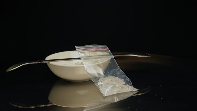 MDMA Ecstasy or molly in form of crystals or rocks. Crystals can be broken into smaller shards or rocks and sold in powders or crystal pebble like pieces then swallowed, snorted or putted on gums.