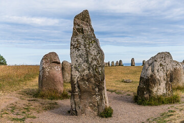Ales Stenar, Sweden's well preserved megalithic monument, stands as a ship shaped stone setting, marking a historical site with its impressive ancient rocks facing the Baltic Sea