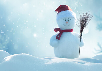 Merry christmas and happy new year greeting card .Cheerful snowman  standing in winter christmas landscape.