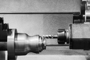 Modern programmable metalworking CNC multifunctional milling drilling grinding tool automatic machine, industrial concept background.