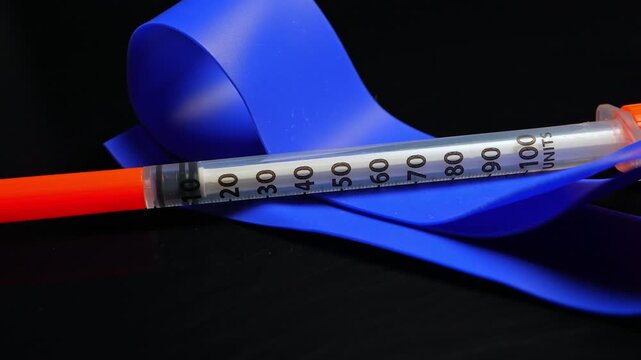 Needle and syringe with tourniquet used to inject drugs into veins, intravenous, muscles intramuscular, and under the skin subcutaneous. Tourniquet used for identifying a vein for injection entry.