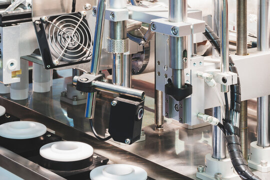 Conveyor for the production and packaging of food products in plastic packaging, industrial concept background