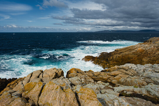 Raging ocean waves crashing against the rocky promontory near the Galician city of La Coru&ntilde;a.