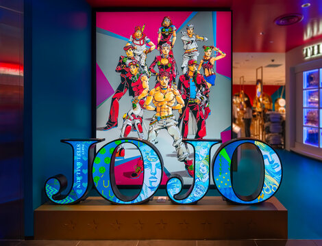 tokyo, shibuya - sep 12 2025: Japanese illuminated installation showcasing Araki Hirohiko&rsquo;s JoJo&rsquo;s Bizarre Adventure Steel Ball Run series aside THE★JOJO WORLD, Bandai Namco&rsquo;s official anime shop.