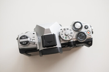 Modern digital camera with a vintage look, seen from above