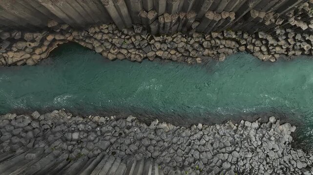 Studlagil Canyon Aerial View with Turquoise River and Basalt Columns